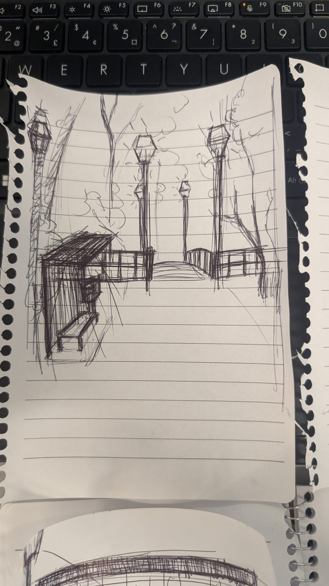 final drawing of space with little library bench, and lamp posts